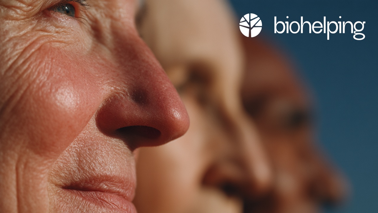 Close-up of older adults’ faces in warm sunlight, symbolizing vitality, resilience, and Biohelping’s focus on healthspan